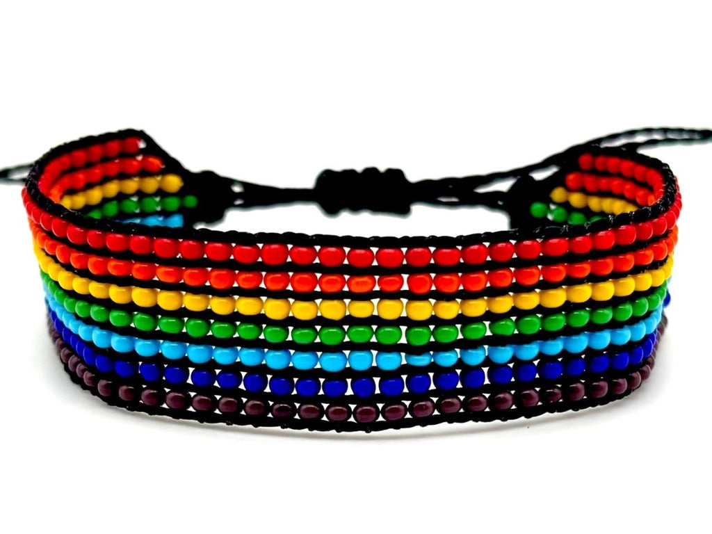 Rainbow striped beaded bracelet with premium glass beads on leather, handmade in Guatemala, fair trade.