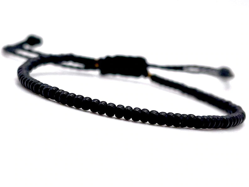 Amazon.com: Wustifyz - Black Thread Bracelet Nylon Cord Adjustable Wrist  Band Negative Energy Remover Vadic Kala Dhaga Bracelet with Stylish Lock  for Women Men Hand, Pack of 1, Nylon, Imitation : Clothing,